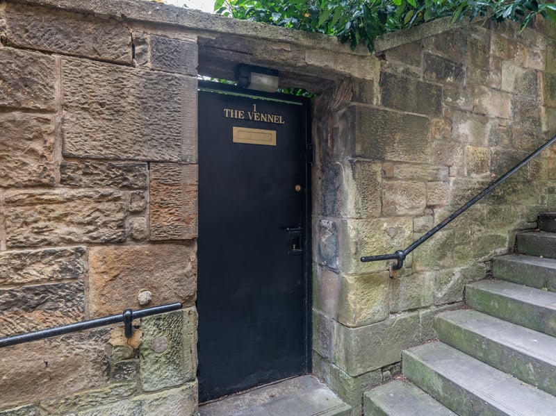 The flat sits within a Category B listed stone building that forms part of the Edinburgh World Heritage Site, developed in the early 19th century and discreetly tucked behind its own private gate.
