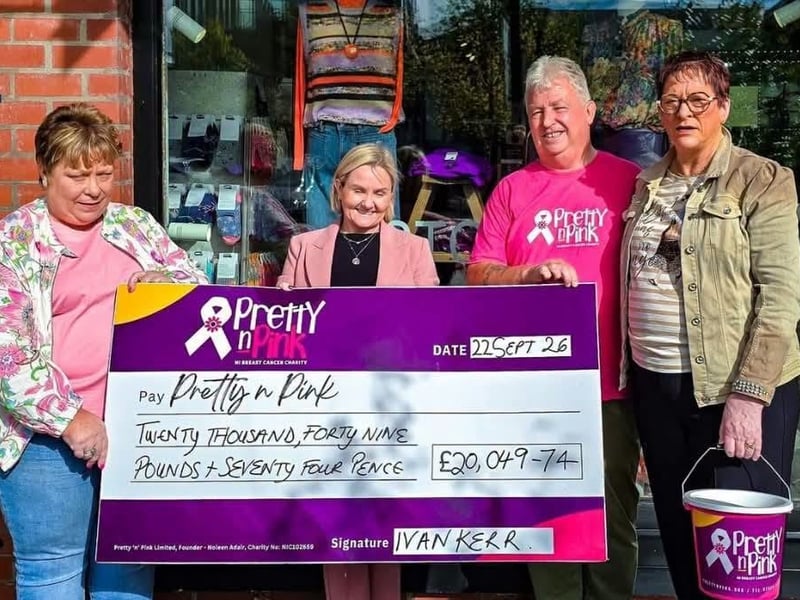 The total amount raised was displayed on a cheque outside Storey Womenswear in Moygashel.