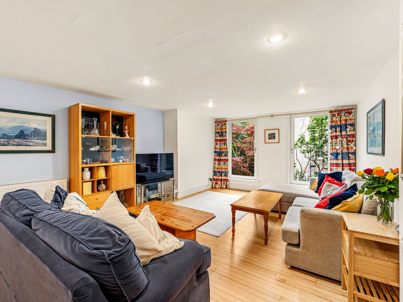 The front door opens into a welcoming hall which leads to an impressive open plan sitting/dining room and kitchen. This wonderfully proportioned space enjoys views across the garden and provides ample room for both everyday living and entertaining.