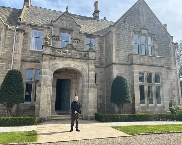 Kevin Savage in front of Gilford Castle