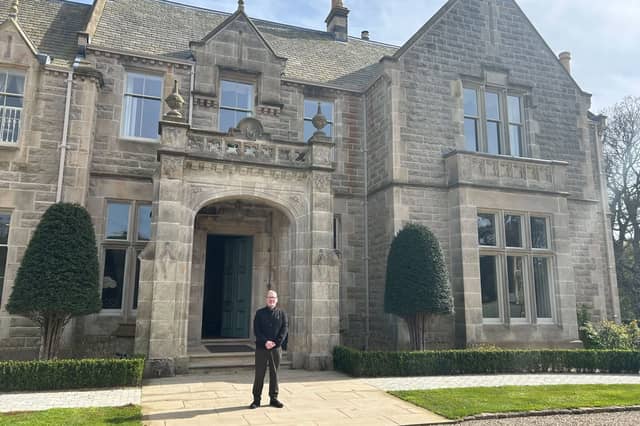 Kevin Savage in front of Gilford Castle