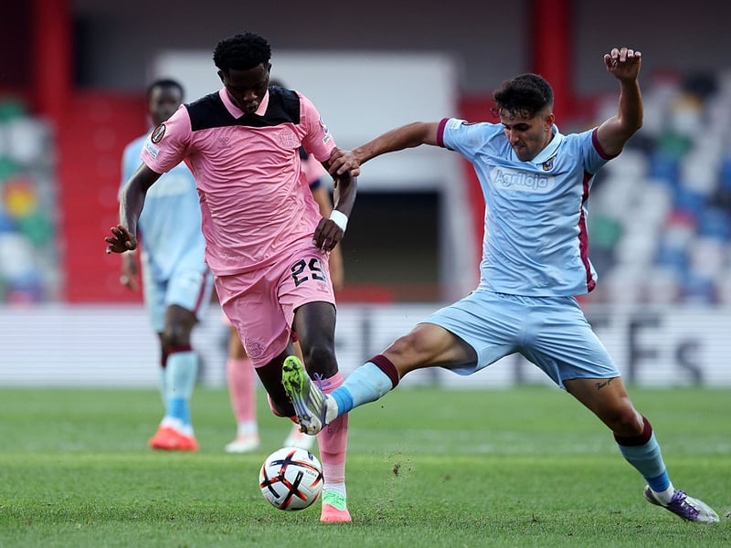 Jules Ahoka of Sunderland is challenged by Alex Alfaro of SC Uniao Torreense.