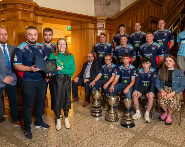 Newbuildings Cricket Club has been recognised by the Mayor of Derry and Strabane, councillor Grace Uí­ Niallais, following their stellar 2026 season during which they achieved a remarkable treble in becoming North West Premiership Champions, Faughan Valley T20 and North West Senior Champions. Receiving a civic crystal gift to commemorate the event is team captain, Ross Hunter with,  chairman, Andy Guy, vice-captain, Ryan Hunter and teammates.