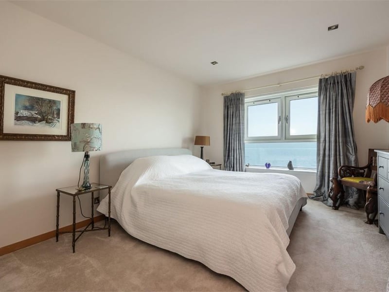 Both double bedrooms enjoy waterfront outlooks and have fitted wardrobes and their own en-suites.