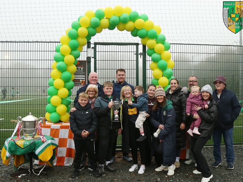 AFTER the official opening of the 4g Pitch a memorial match in honour of Micéal Murphy between u12 Boys Newtown Emmets and Shane O’Neills. Members of Micéals family attended the match pictured holding his Cup. LB4070