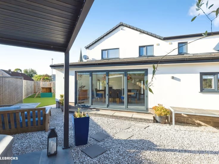 It's a spacious and versatile five bedroom extended detached family home, offering modern living, flexible accommodation and excellent outdoor space.