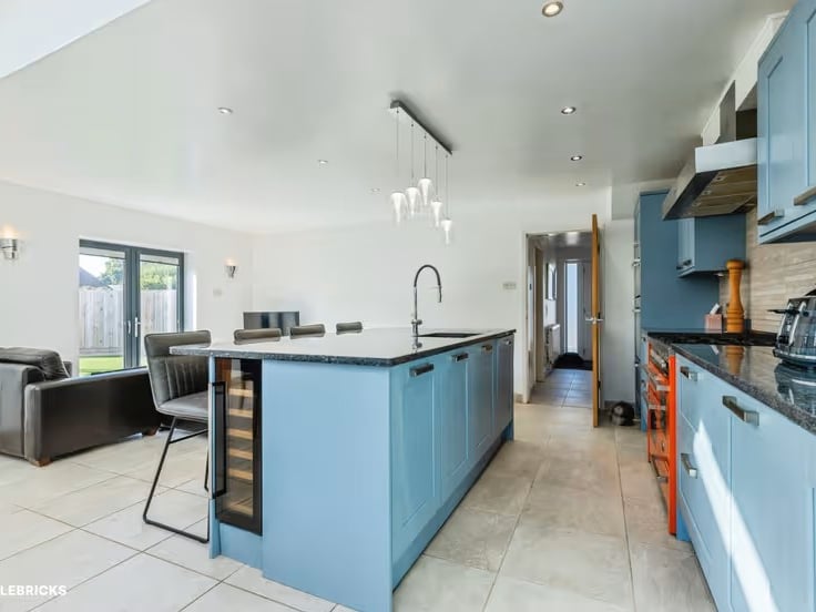 It's a spacious and versatile five bedroom extended detached family home, offering modern living, flexible accommodation and excellent outdoor space.