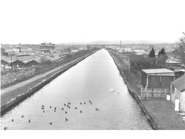 A photograph of the 'Straight Mile' on the Leeds-Liverpool Canal, Burnley. This was constructed c1800 and was built on a man made embankment.