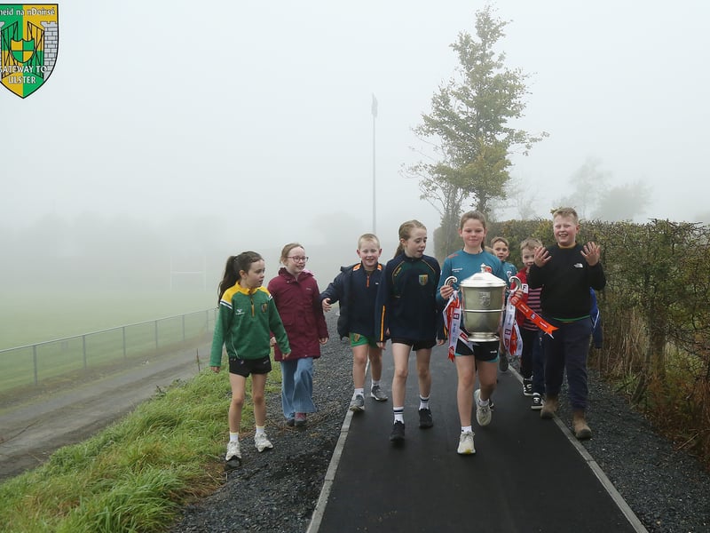 Children, staff and parents of St. Olivers Carrickrovaddy enjoying their sponsored walk on Dorseys newly tarred walking track. LB4067