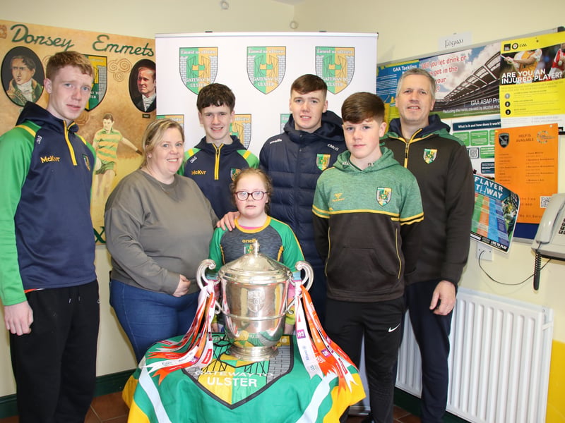 THE McGlinchey family l-r Conal, Mary Mum,  Ciaran, Eoin, Cormac and Dad Ciaran with Niamh holding the Armagh Cup in front. LB4078