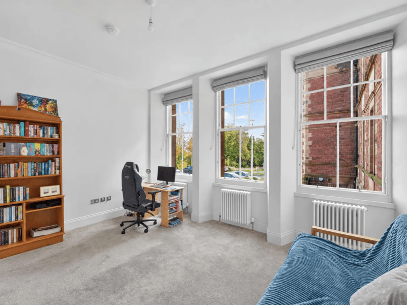 Another large room inside this property, the second bedroom is currently used as an office, ideal for working from home.