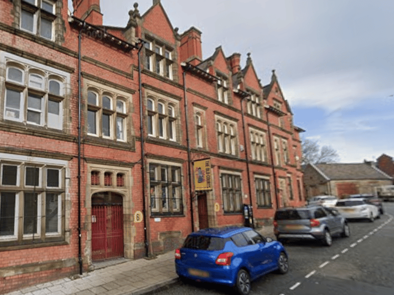Long before it became a creative arts hub, this building served as Wigan's historic courts. Down in the basement lie the original death sentence holding cells. Visitors and staff have reported cold spots, the clanging of phantom cell doors, and heavy, shuffling footsteps echoing through the empty corridors.