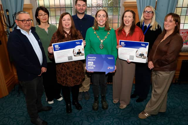 Mayor of Derry and Strabane, councillor Grace Uí Niallais, at the launch of Talk Money Week led by the Money and Pension Services and held in the Mayor's Parlour. From left, are Gary McGouran, Make the Call, Na Li, Advice North-West, Helen Harley, Derry City and Strabane District Council, Ronan Convery, Consumer Council, Ciara McLaughlin, Advice North-West, Yasmin Johnstone, Trading Standards and Margaret McCloskey, Money & Pension Services