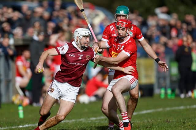 Cushendall's Fred McCurry in action against Loughgiel's Shan McGrath during their Senior Hurling Championship semi-final at Pairc McUílín, Ballycastle.