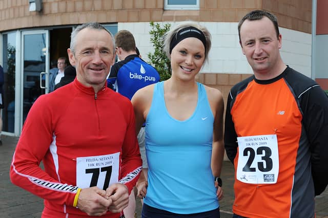 Johnny McCabe and Brian Cafferty (Setanta Club), with Orla McAdam (The Apprentice), are ready for the Felda/Setanta 10k