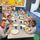 It's a 'thumbs up' from the children at Newtownstewart Model Primary School s they enjoy their new Breakfast Club
