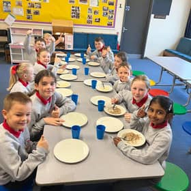 It's a 'thumbs up' from the children at Newtownstewart Model Primary School s they enjoy their new Breakfast Club