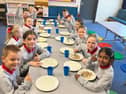 It's a 'thumbs up' from the children at Newtownstewart Model Primary School s they enjoy their new Breakfast Club