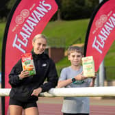 Last year’s League winner Jackson Nellis from DH Christie Memorial Primary School with League Ambassador, Kirsti Foster at the Mary Peter’s Track for the launch of the 2026-27 Flahavan’s Athletics NI Primary School Cross Country League.