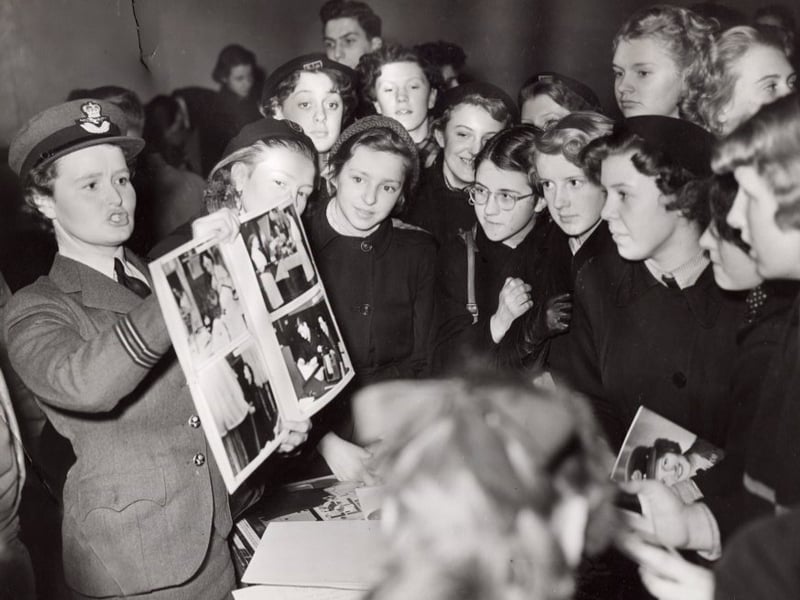 Flying Officer Lang explains life in the WRAF to girls at the Central Technical School, Sheffield, as part of a careers information evening in 1956
