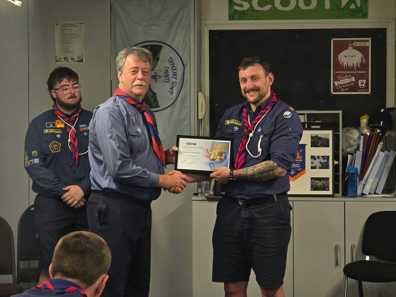 Pat English presenting 2 year service award to Shane O’Loughlin