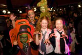 GILLIAN Fitzpatrick, Chairperson Newry Mourne and Down District Council pictured with some of the fancy dress winners enjoying the spooktacular Newry Twilight Market 10 years ago. NM4534