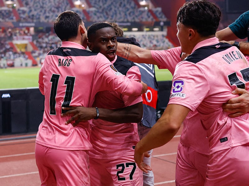 Sunderland players celebrate after late Europa League drama.
