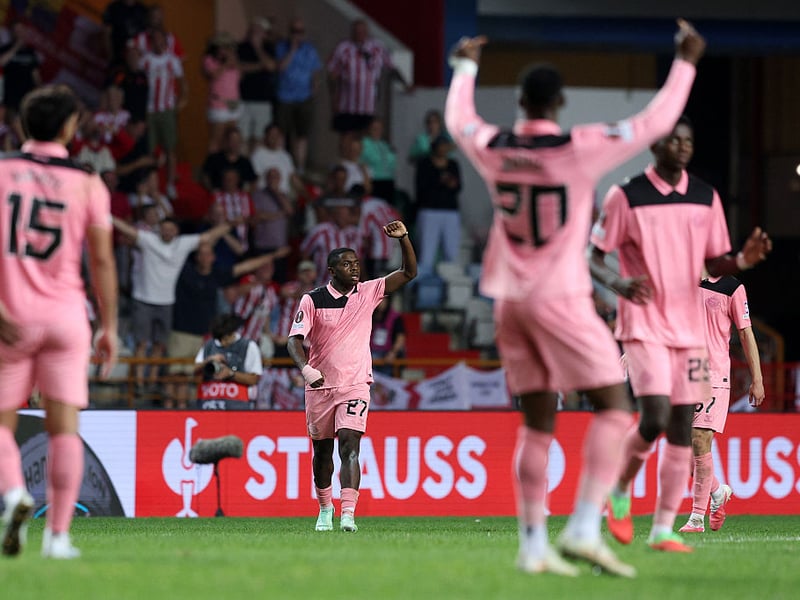 Sunderland players and fans celebrate after late Europa League drama.