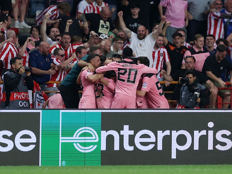 Sunderland players and fans celebrate after late Europa League drama.