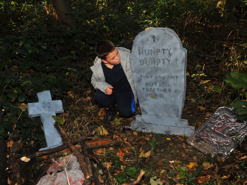 Reuben Franklin next to the grave of Humpty Dumpty 