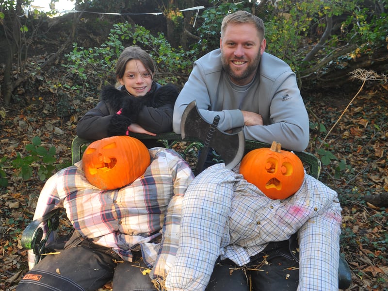 Florence Butcher and her uncle Ricky Hemingway with some very cool scarecrows 