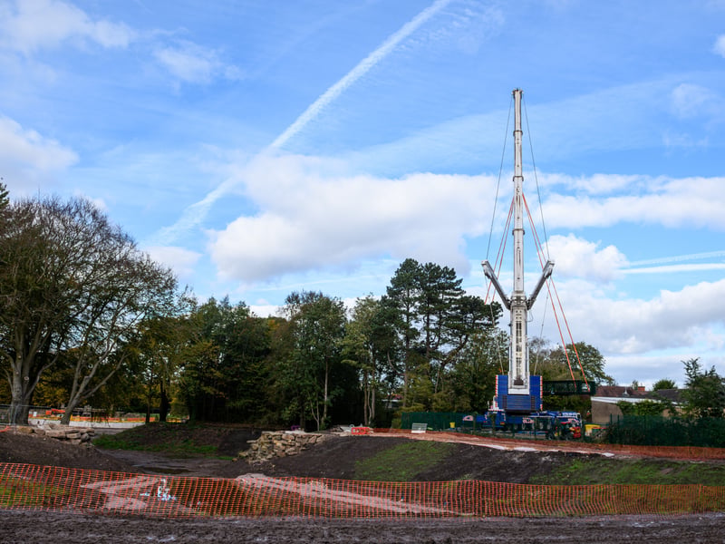 Serpentine Lake bridge is lowered into place by crane at Moor Park, Preston. Photo: Kelvin Lister-Stuttard