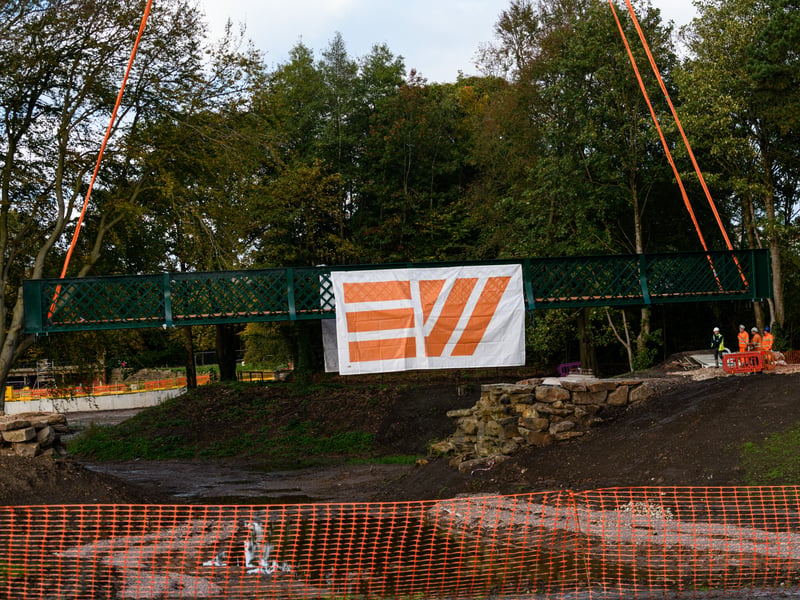 Serpentine Lake bridge is lowered into place by crane at Moor Park, Preston. Photo: Kelvin Lister-Stuttard