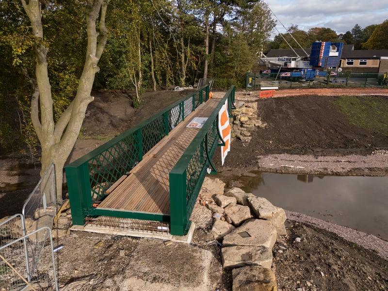 Serpentine Lake bridge after being lowered into place by crane at Moor Park, Preston. Photo: Kelvin Lister-Stuttard
