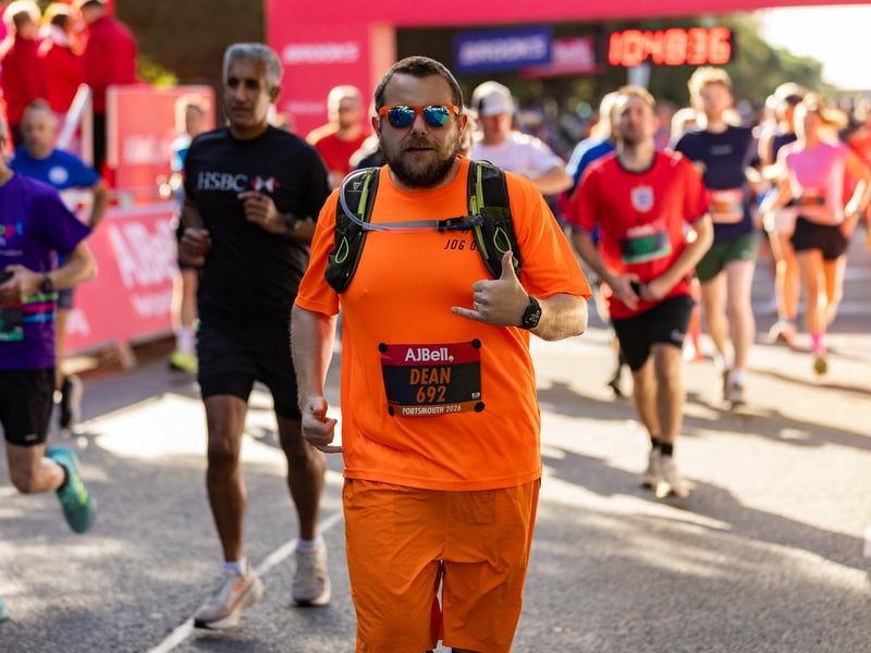 Great South Run 2026 green and orange waves