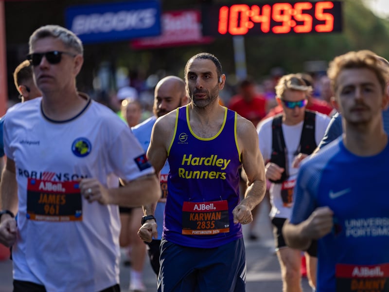 Great South Run 2026 green and orange waves