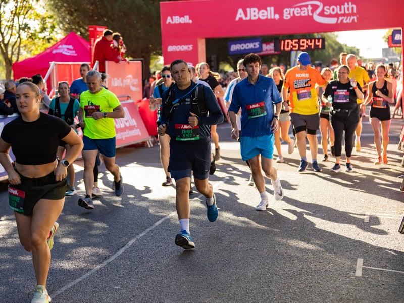 Great South Run 2026 green and orange waves