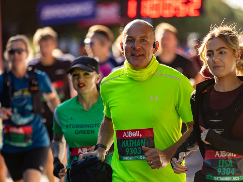 Great South Run 2026 green and orange waves