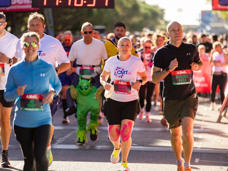 Great South Run 2026 green and orange waves