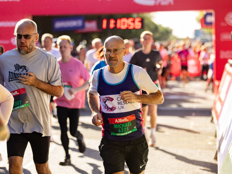 Great South Run 2026 green and orange waves