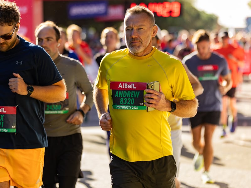 Great South Run 2026 green and orange waves
