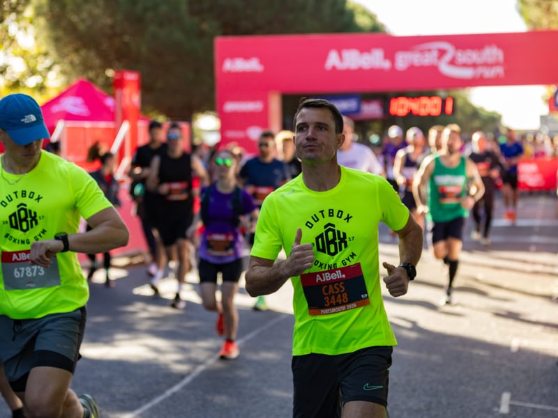 Great South Run 2026 green and orange waves