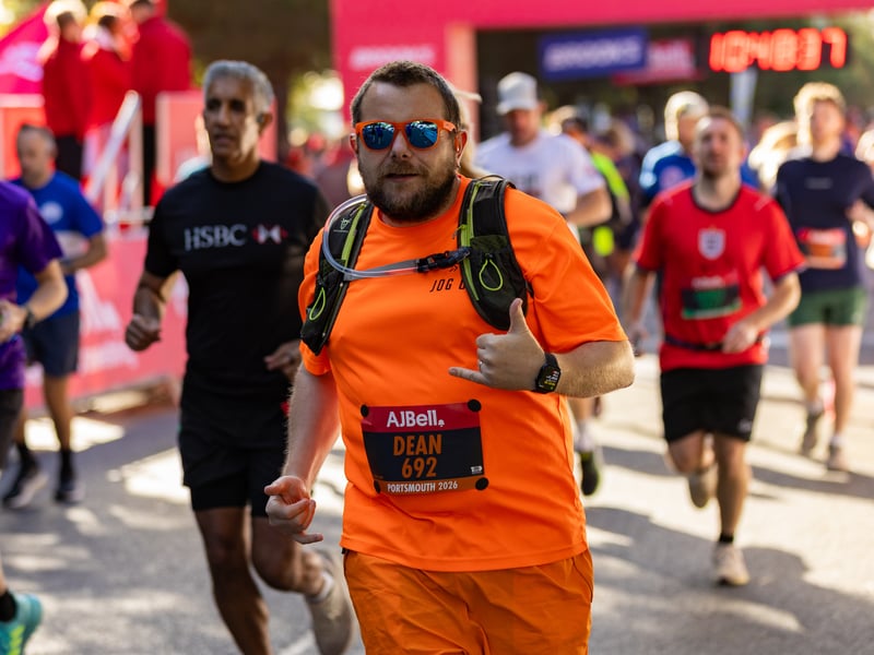 Great South Run 2026 green and orange waves