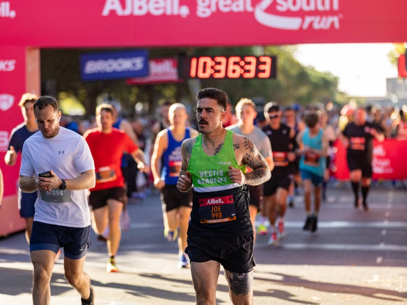 Great South Run 2026 green and orange waves