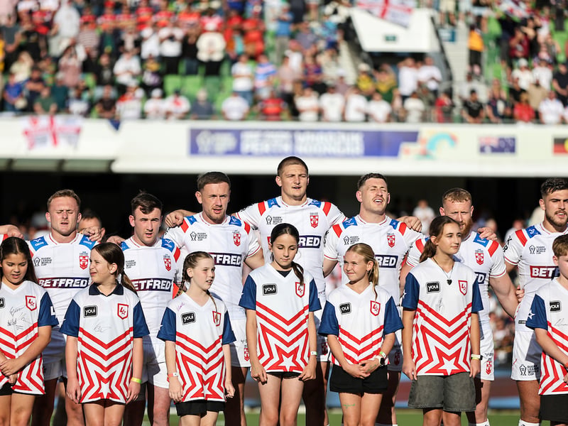 From left to right: AJ Brimson, Jez Litten, Harry Smith, Ben Currie, Sam Walters, Max King, Luke Thompson and Brad O'Neill sing the national anthem