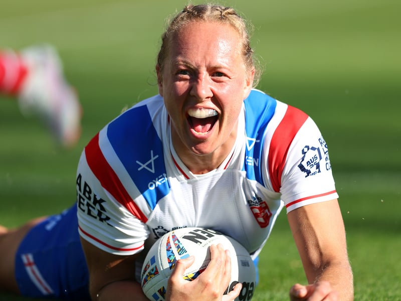 England star Anna Davies celebrating one of her tries against Wales