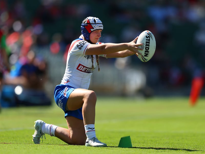 England halfback Izzy Rowe lining up a conversion kick