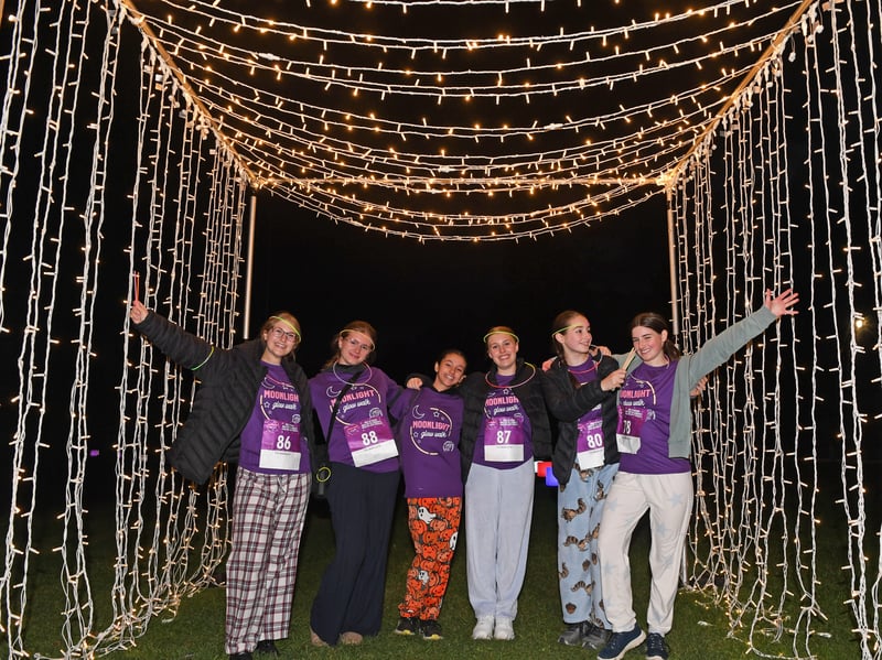 Fundraisers taking part in the walk bring colour and sparkle to the evening, glowing in the dark as they support Saint Michael’s Hospice