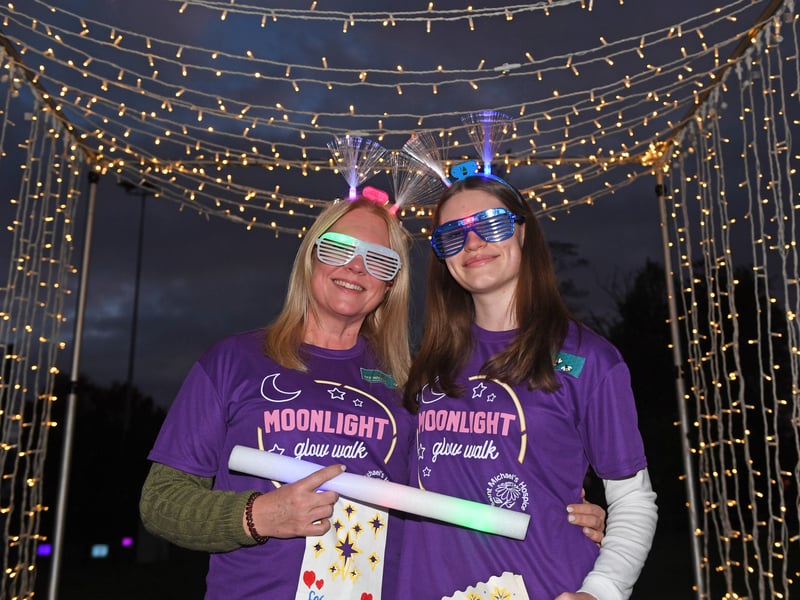 Kim Marshall and Emily Marshall getting their glow on with colourful accessories to support Saint Michael’s Hospice