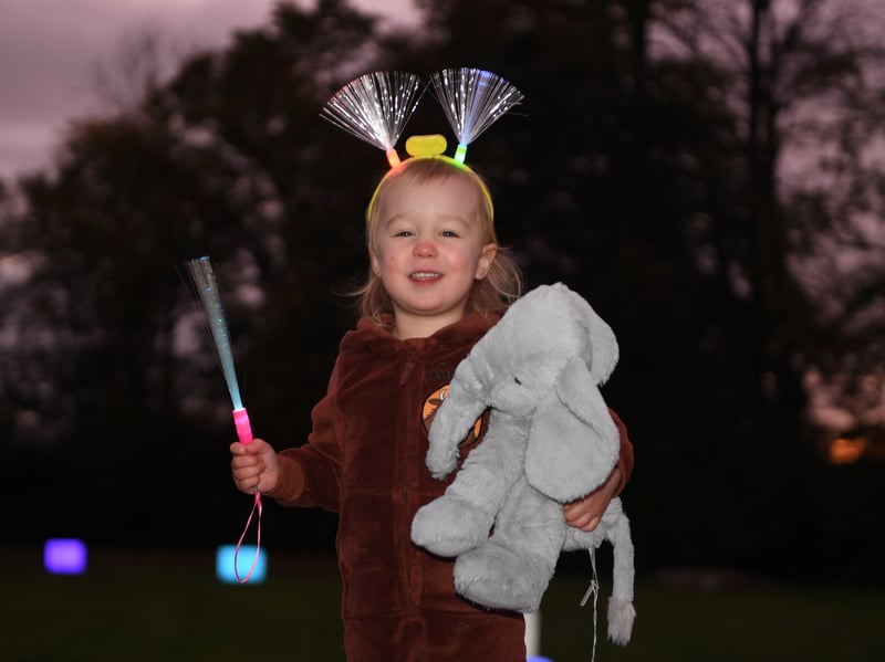 Ivy, aged two, gets her glow on with colourful accessories to support Saint Michael’s Hospice